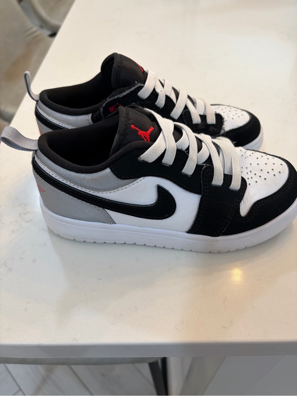 Jordan Kids Low-Top Sneakers in Black White Gray with Red Jumpman